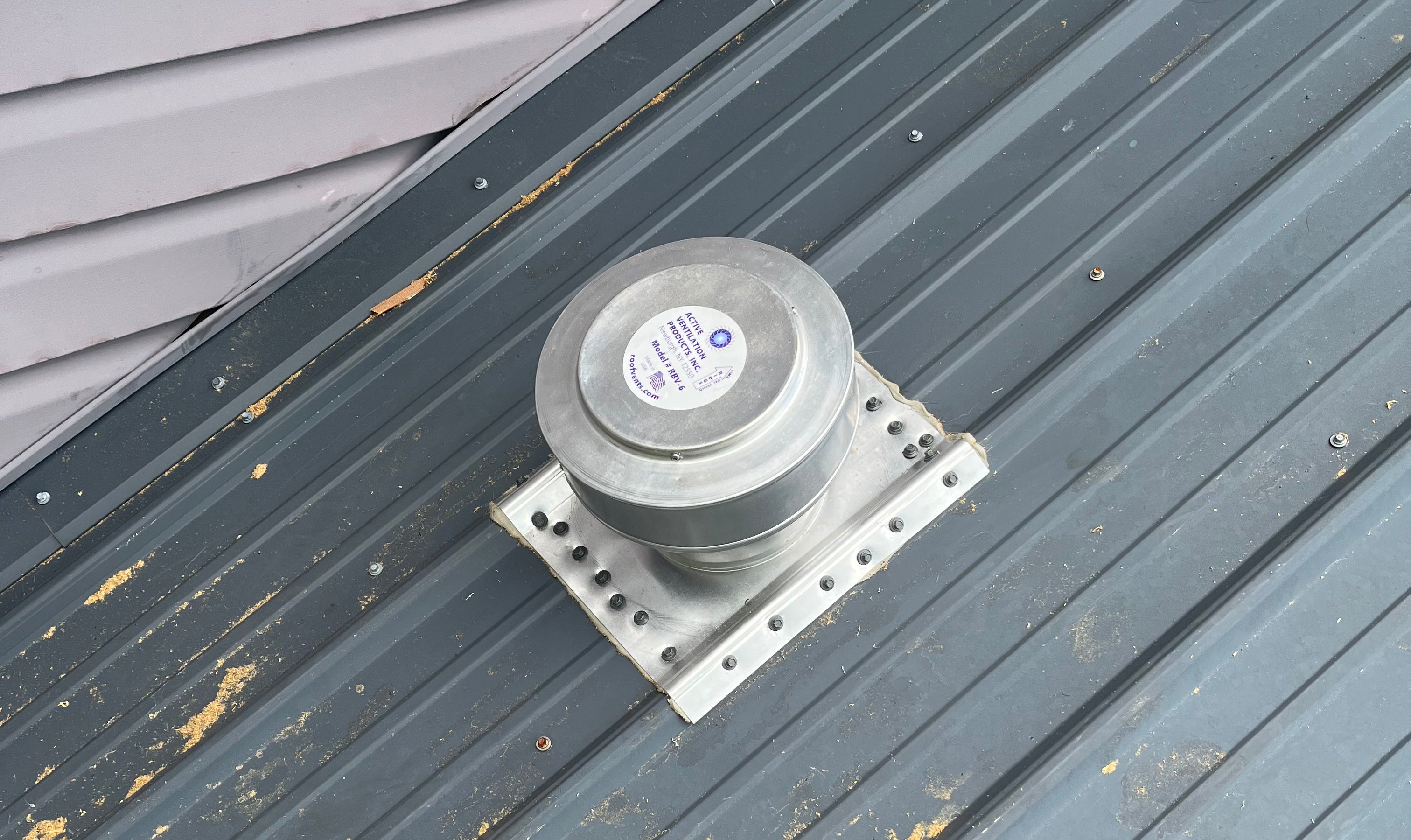 Round Back Roof Vents for SM-Rib Panel Metal Roofs - Installation Photo