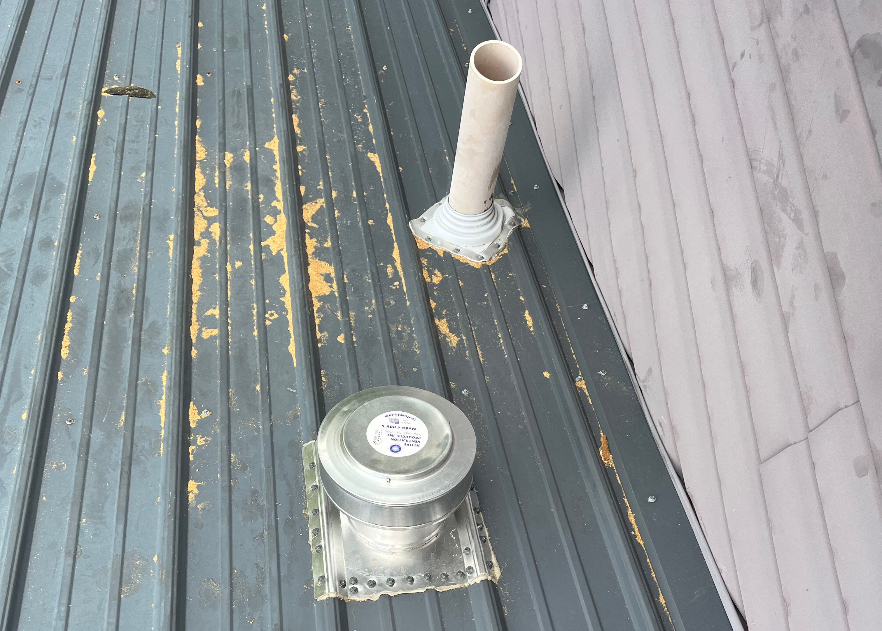 Round Back Roof Vents for SM-Rib Panel Metal Roofs - Installation Photo
