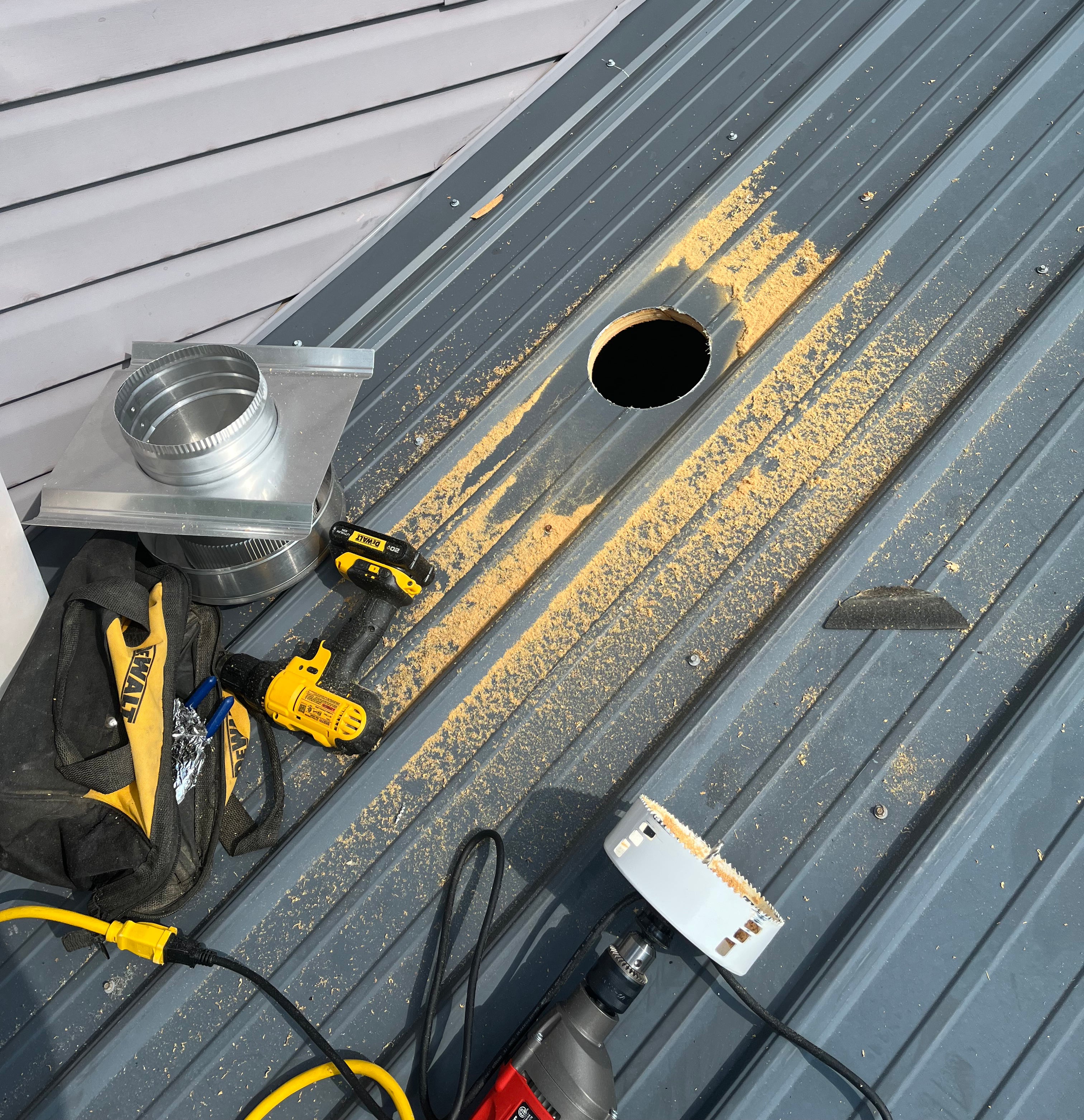Round Back Roof Vents for SM-Rib Panel Metal Roofs - Installation Photo