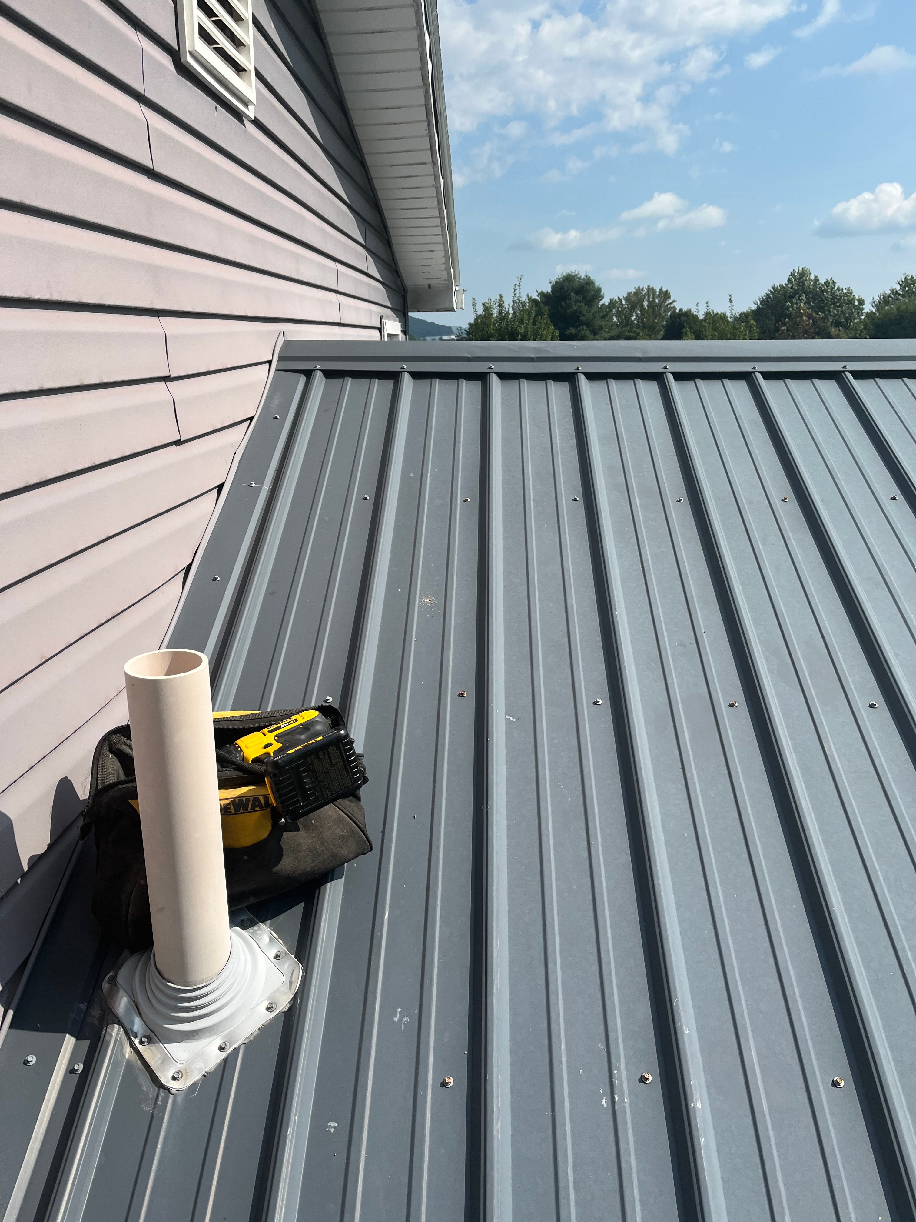 Round Back Roof Vents for SM-Rib Panel Metal Roofs - Installation Photo